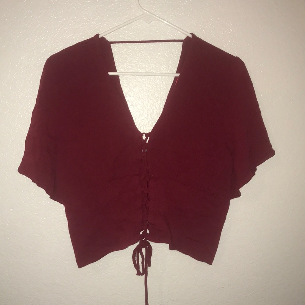 Red front lace up crop top.